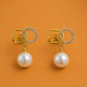 Amélie pearl crystal drop earrings with gold-tone design