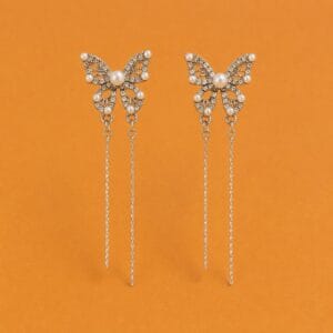Pearl butterfly tassel earrings with two long chain drops