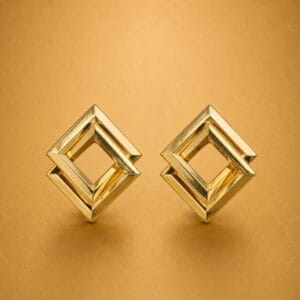 Golden geometric statement earrings with interlocking square design