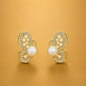 Pearl butterfly earrings with clear stones and gold-tone detailing