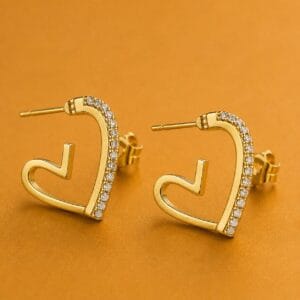 Celeste crystal heart earrings in gold tone
